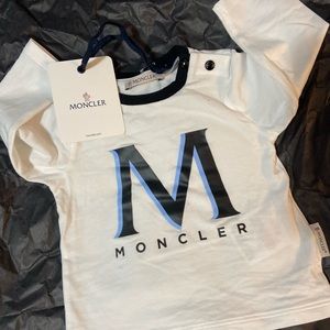 Infant 9 month Monclear white longe sleeve top. Blue and back BIG M logo.